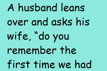 A Husband Leans Over And Asks His Wife