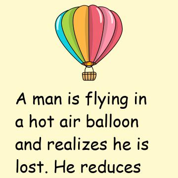 A Man Is Flying In A Hot Air Balloon